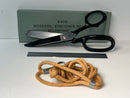 Scissors with black handles and a lanyard on a white background