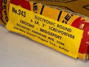 Close-up of a yellow label on a cardboard box with text about a screwdriver.